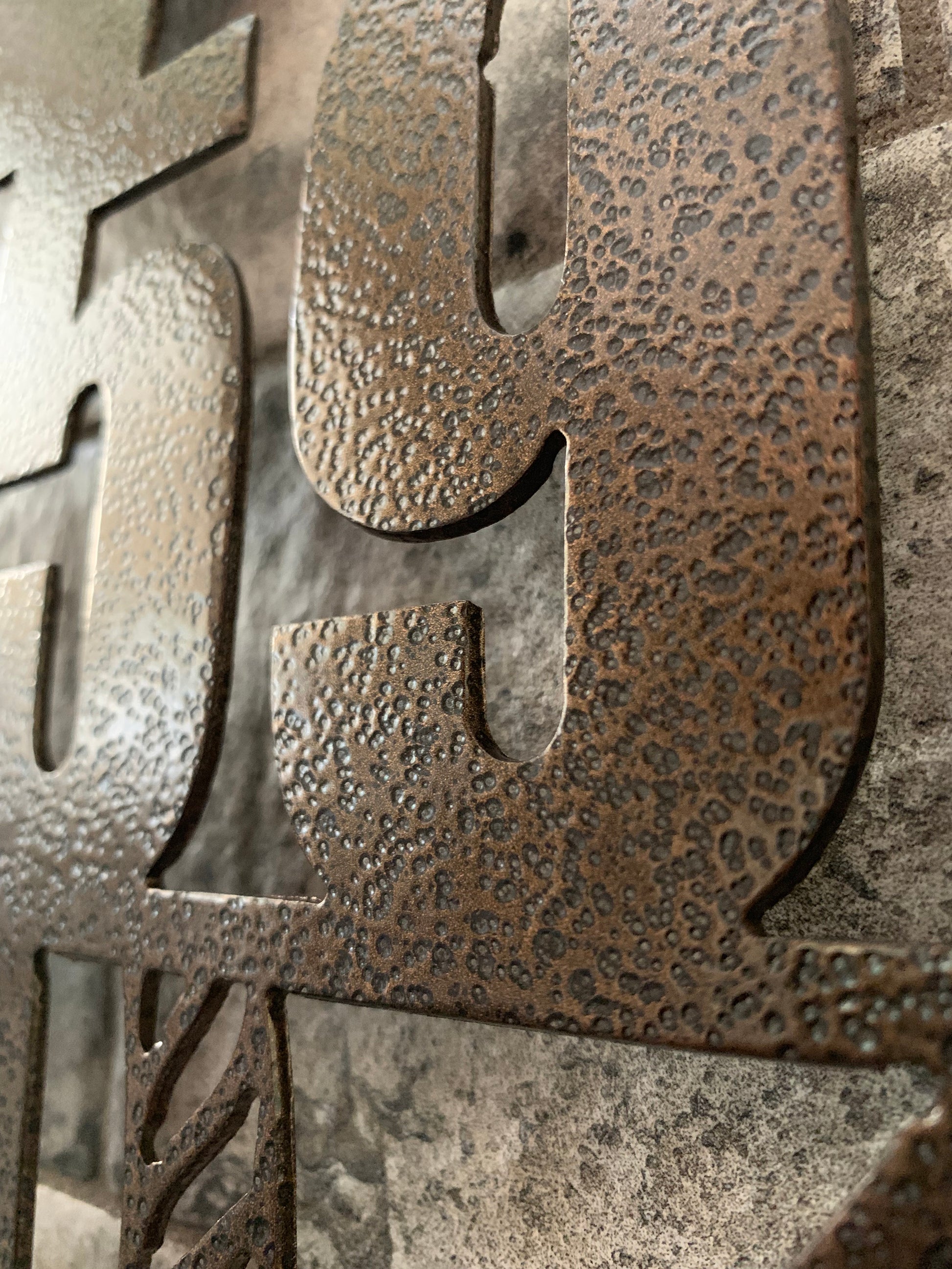 Close up Vertical Anchor Metal Address Sign (Street Numbers Only) in Golden Vien of middle